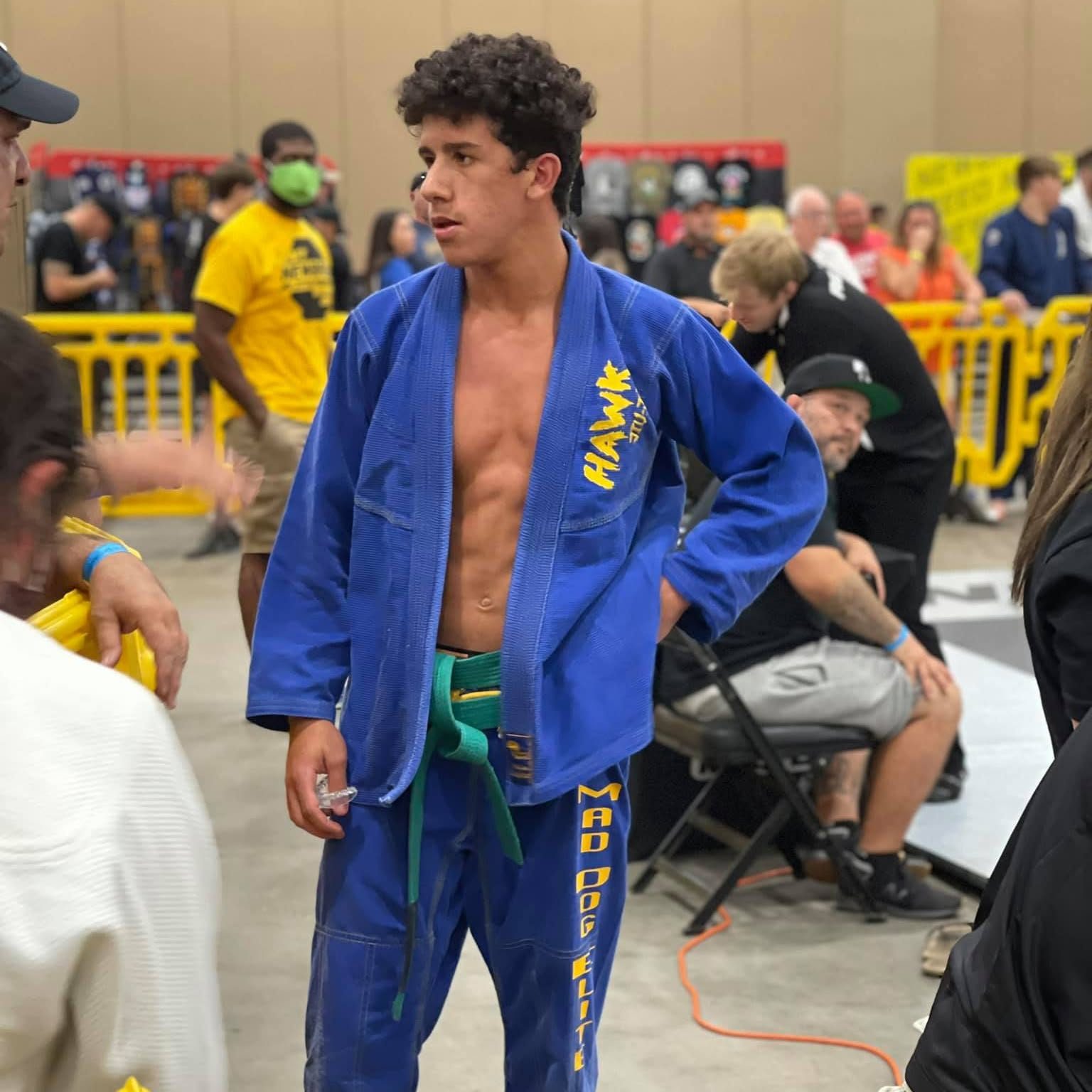 A competitor wearing a Mad Dog Elite gi at a tournament